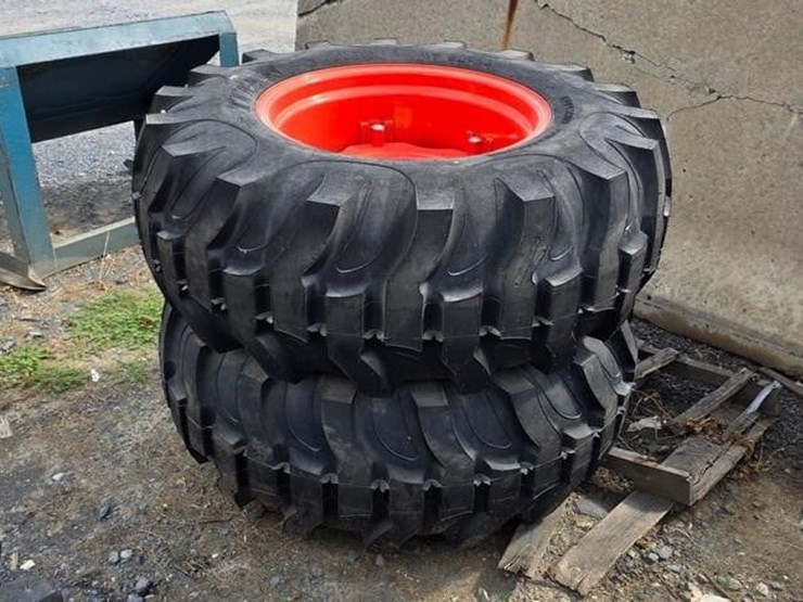 2-titan-17.5-24-tractor-tires-&-rims-image-1