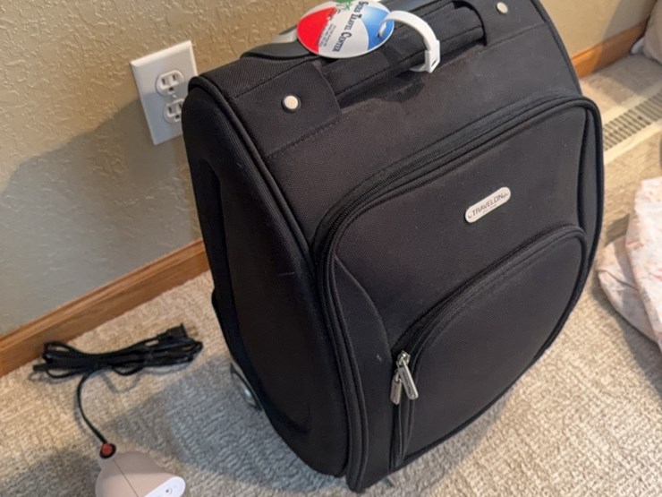 wrinkle-remover-and-like-new-travelon-pull-type-suitcase-image-3