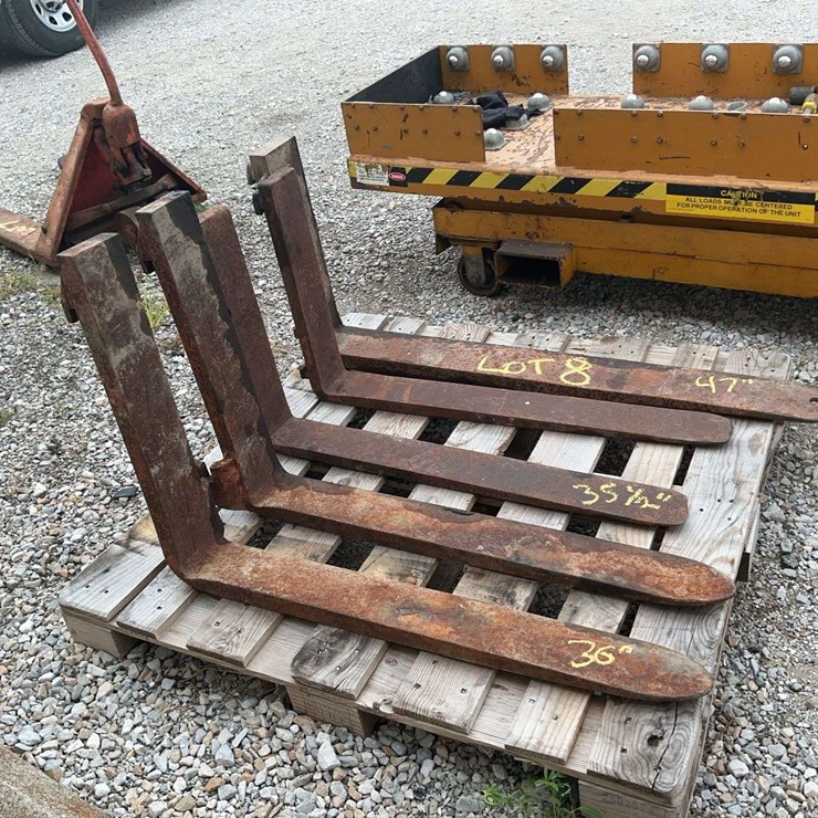 2 sets of pallet forks and 1 single fork