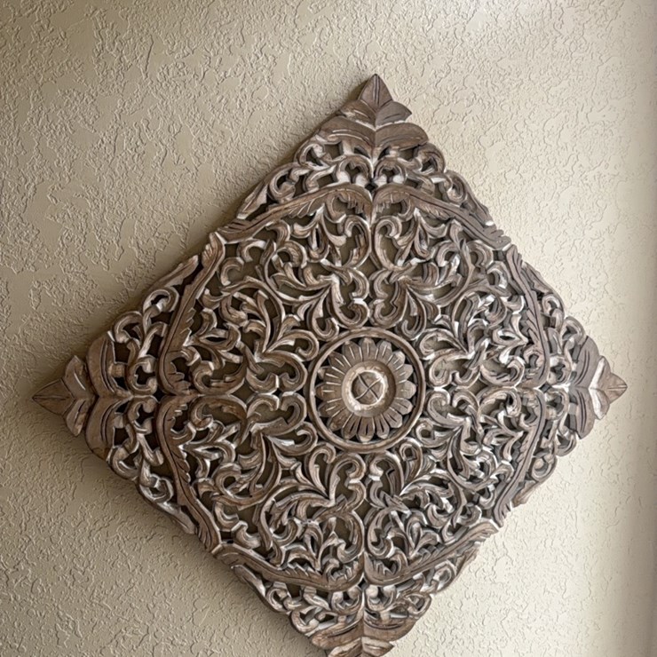 Modern diamond shaped wall decoration, Eifel tower background piece, religious books and other items. (less table)
