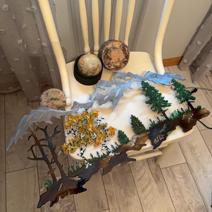 Special art piece, made from metal, laser cut, also note includes miniature globe