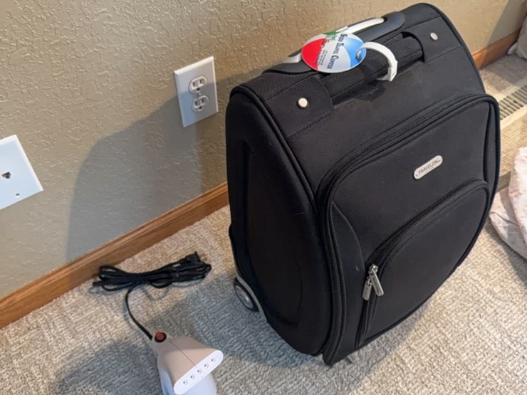 wrinkle-remover-and-like-new-travelon-pull-type-suitcase-image-1