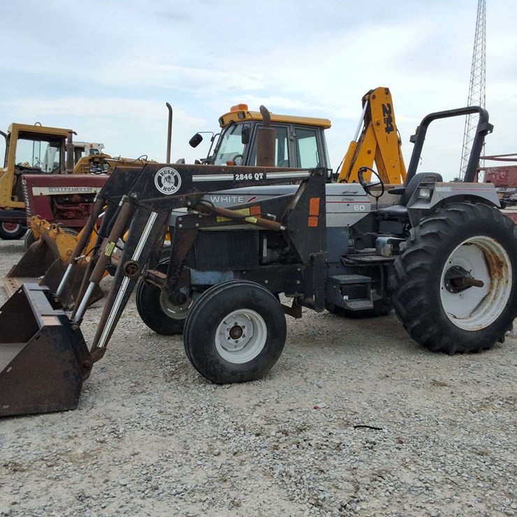White 60 tractor, Cummins engine, 2WD, W2846QT loader, 2nd owner, 1 remote, 3pt, 540PTO, 2515 original hrs., 16.9-34 tires, S/N: 403144-60T