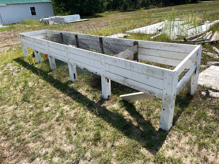 #7969-•-poly-raised-flower-bed-frame-with-rolls-of-wire-fencing-image-1