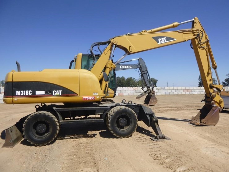 2005-caterpillar-m318c-image-16