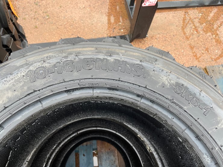#14628-•-set-of-(4)-10-16.5-skid-steer-tires-(mosinee,-wi)-image-6