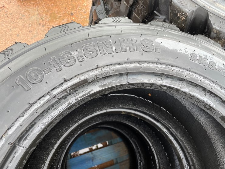 #14629-•-set-of-(4)-10-16.5-skid-steer-tires-(mosinee,-wi)-image-6