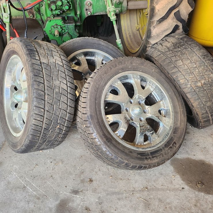 #2838 • (4) Cooper Discoverer HT Plus Tires and Chrome Wheels