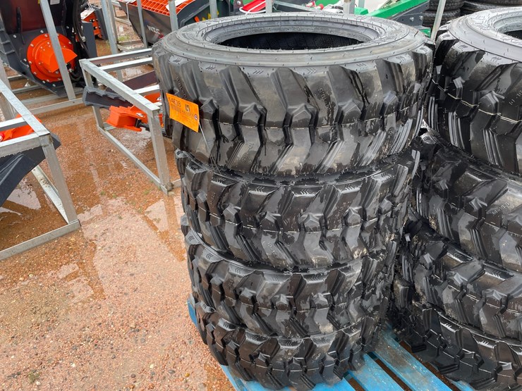#14628-•-set-of-(4)-10-16.5-skid-steer-tires-(mosinee,-wi)-image-2