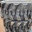 #14629-•-set-of-(4)-10-16.5-skid-steer-tires-(mosinee,-wi)-image-4