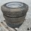 galaxy-9-22.5-tires-on-kinze-8-bolt-wheels-(bid-per-unit)-image-1