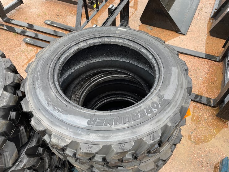 #14630-•-set-of-(4)-10-16.5-skid-steer-tires-(mosinee,-wi)-image-3