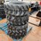 #14628-•-set-of-(4)-10-16.5-skid-steer-tires-(mosinee,-wi)-image-1