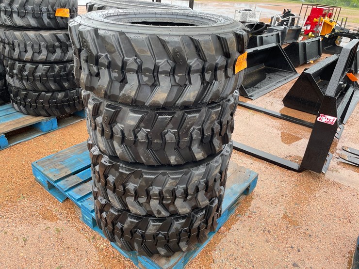 #14628-•-set-of-(4)-10-16.5-skid-steer-tires-(mosinee,-wi)-image-1