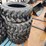 #14630-•-set-of-(4)-10-16.5-skid-steer-tires-(mosinee,-wi)-image-2