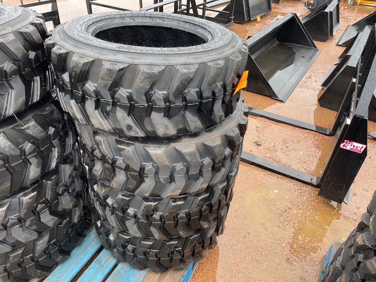 #14630-•-set-of-(4)-10-16.5-skid-steer-tires-(mosinee,-wi)-image-2
