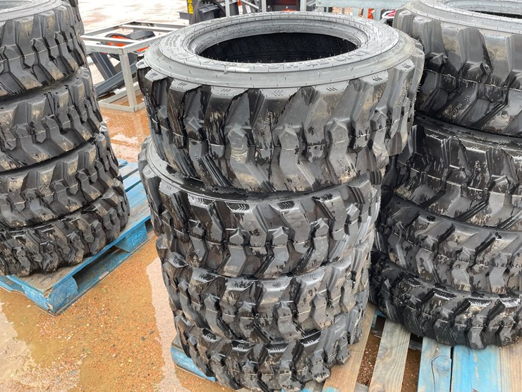 #14630-•-set-of-(4)-10-16.5-skid-steer-tires-(mosinee,-wi)-image-1