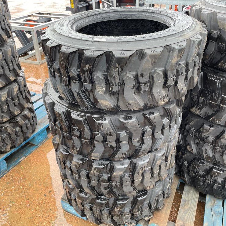 #14630 • Set of (4) 10-16.5 Skid Steer Tires (Mosinee, WI)