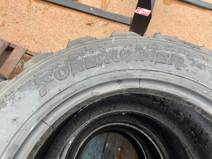 #14631-•-set-of-(4)-10-16.5-skid-steer-tires-(mosinee,-wi)-image-4