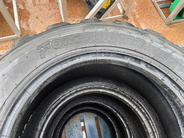 #14628-•-set-of-(4)-10-16.5-skid-steer-tires-(mosinee,-wi)-image-5
