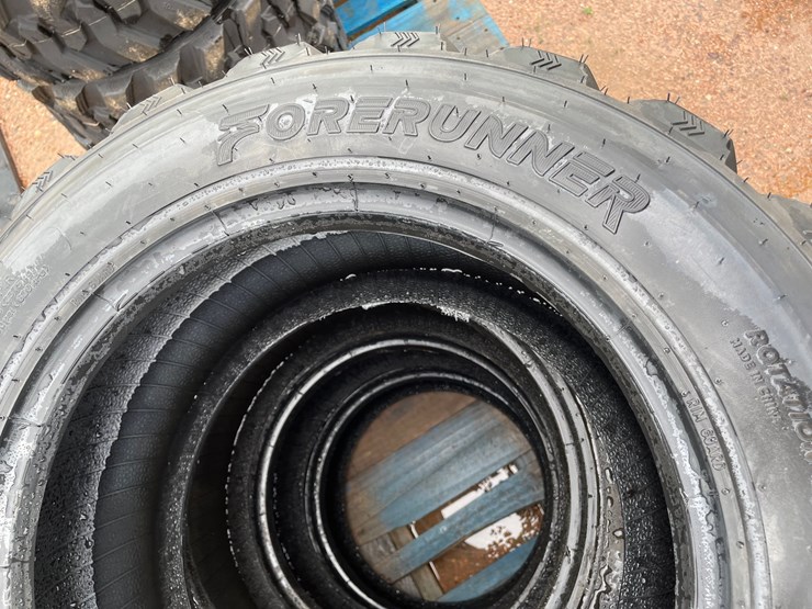 #14630-•-set-of-(4)-10-16.5-skid-steer-tires-(mosinee,-wi)-image-5