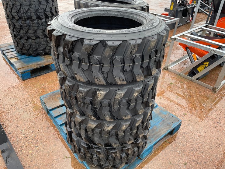 #14629-•-set-of-(4)-10-16.5-skid-steer-tires-(mosinee,-wi)-image-2