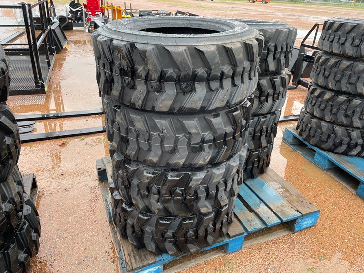 #14631-•-set-of-(4)-10-16.5-skid-steer-tires-(mosinee,-wi)-image-1