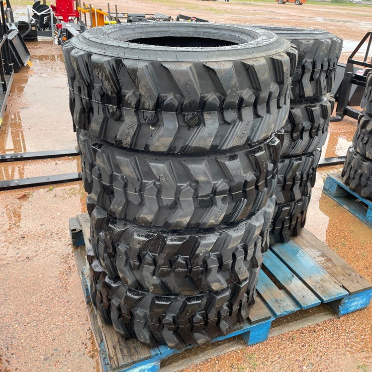 #14631 • Set of (4) 10-16.5 Skid Steer Tires (Mosinee, WI)