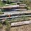 #2830-•-(13)-reclaimed-wood-posts-and-timbers-with-flat-hose-image-1