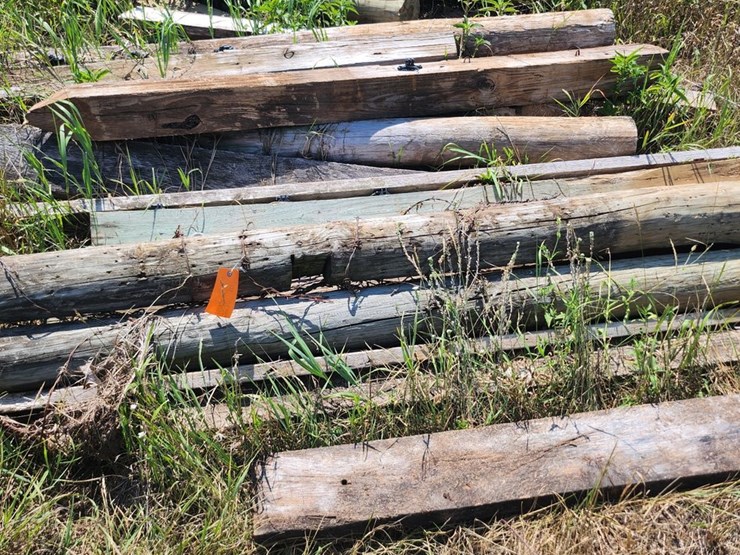 #2830-•-(13)-reclaimed-wood-posts-and-timbers-with-flat-hose-image-1