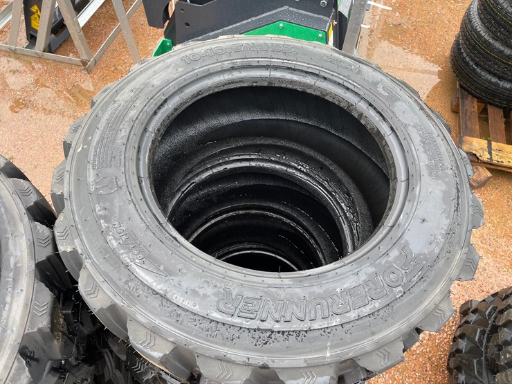 #14631-•-set-of-(4)-10-16.5-skid-steer-tires-(mosinee,-wi)-image-3