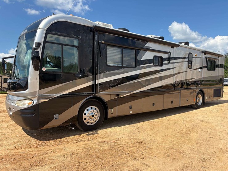 2003-freightliner-xc-fleetwood-revolution-diesel-pusher-motor-home-(65,650-miles)-image-1