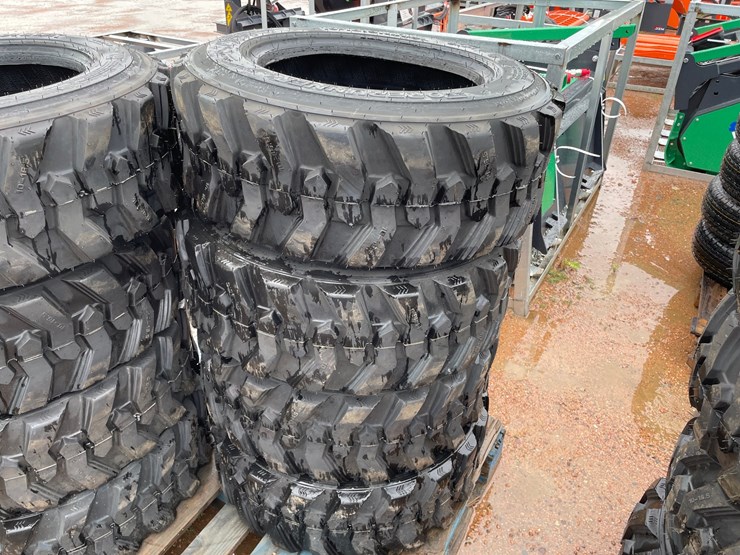 #14631-•-set-of-(4)-10-16.5-skid-steer-tires-(mosinee,-wi)-image-2