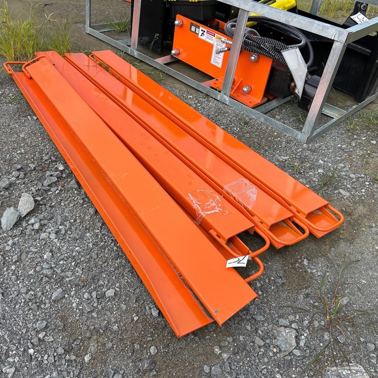 #32 • FOUR SETS OF PALLET FORK EXTENSIONS
