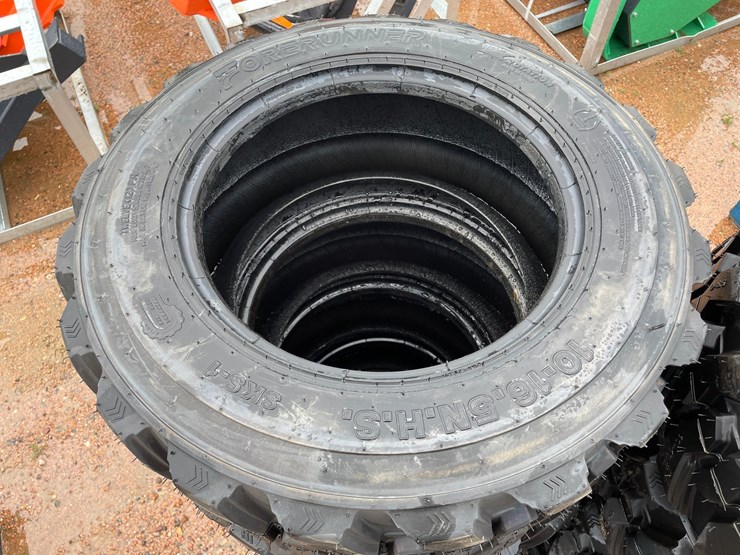 #14628-•-set-of-(4)-10-16.5-skid-steer-tires-(mosinee,-wi)-image-3