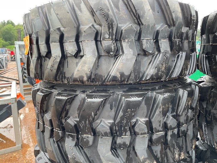 #14628-•-set-of-(4)-10-16.5-skid-steer-tires-(mosinee,-wi)-image-4