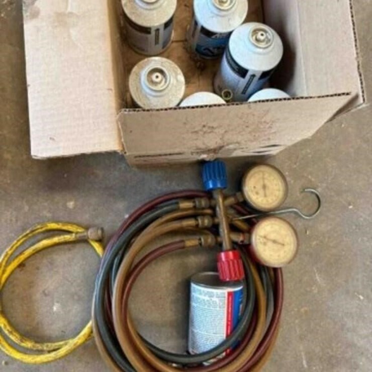 HVAC Guage and 7 Cans of 134A