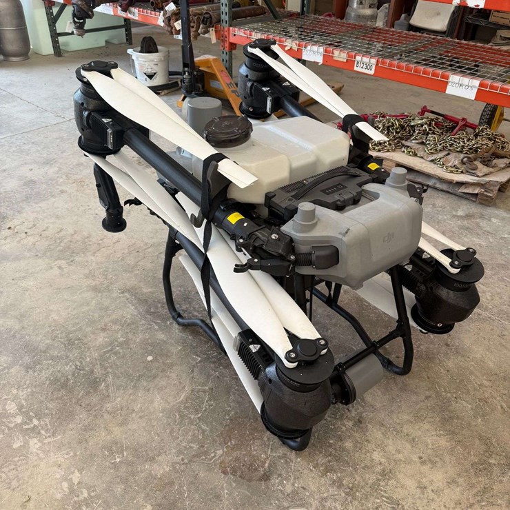 DJI T50 Spray Drone purchased new in 2024 w/3 batteries, inverter, controller, charger-generator, inverter, never wrecked, 3,861 acres, 109.46 hrs. 1,137 flights s/n 63YBMAF0020080 AND READY TO FLY/SPRAY. (IN BUILDING)