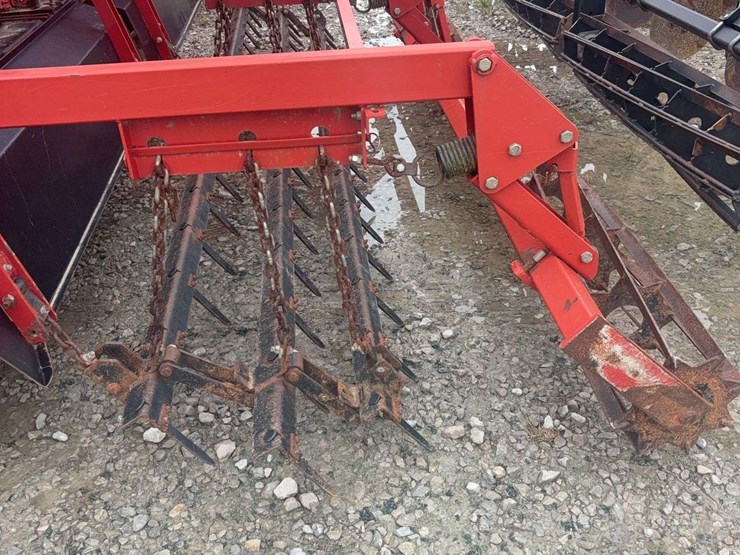 25ft-reel-disk,-levelly-bar,-5-bar-harrow,-single-rolling-basket,-tandem-axle,-19"-disc-blade-and-beater-bar.-image-9