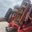 25ft-reel-disk,-levelly-bar,-5-bar-harrow,-single-rolling-basket,-tandem-axle,-19"-disc-blade-and-beater-bar.-image-8