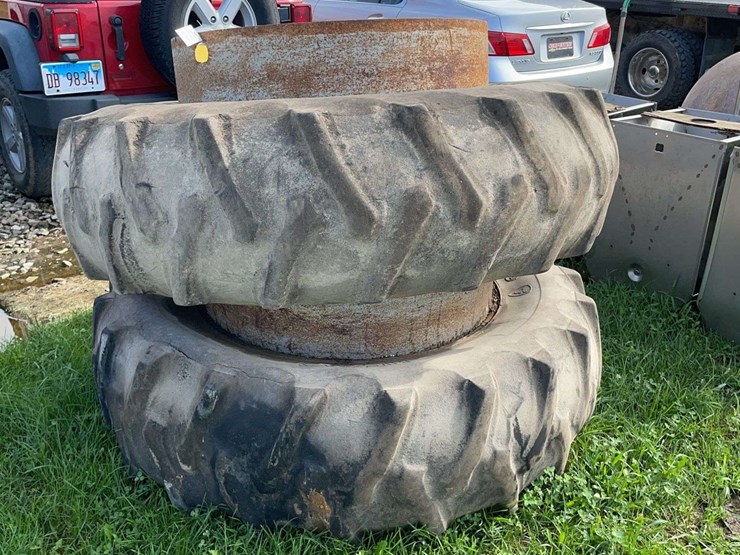 pair-of-firestone-18.4-38-clamp-on-duals,-rims-are-good-needs-new-tires-image-1