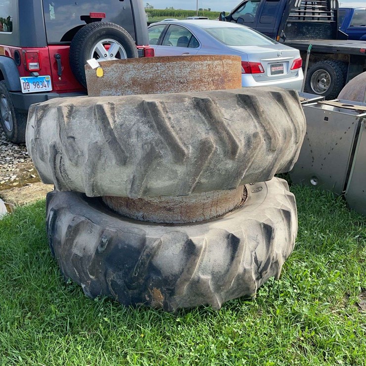 Pair of Firestone 18.4-38 clamp on duals, rims are good needs new tires
