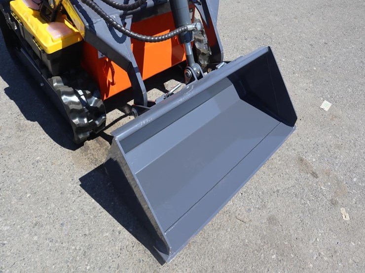 tpm-t460-stand-on-skid-steer-loader-image-12