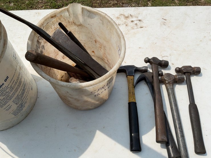(2)-buckets-of-misc.-tools-to-include-hammers,-level,-and-electric-clippers.-#228-image-4