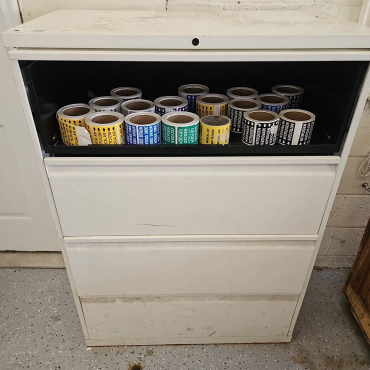 CABINET WITH ASSORTED PIPE LABELS