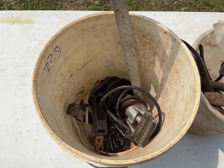 (2)-buckets-of-misc.-tools-to-include-hammers,-level,-and-electric-clippers.-#228-image-5