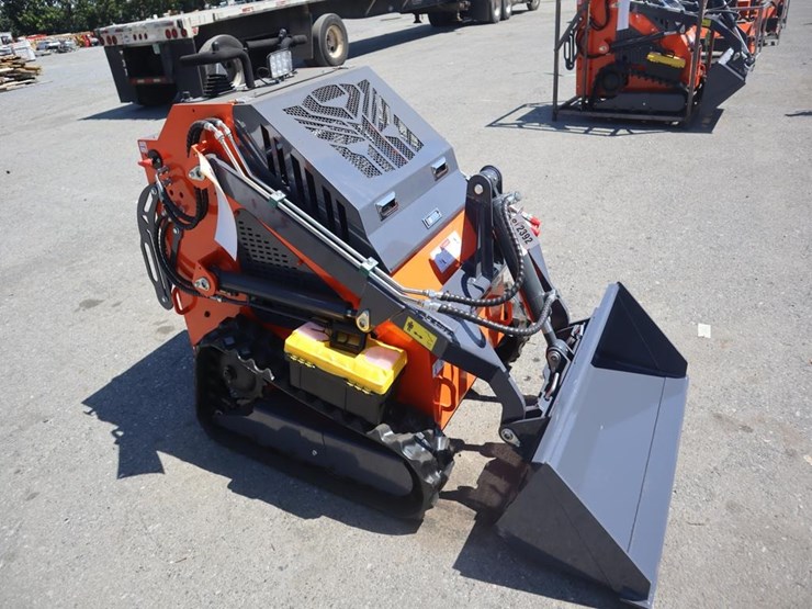 tpm-t460-stand-on-skid-steer-loader-image-1