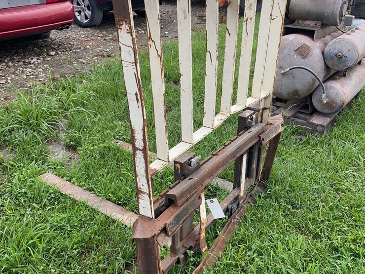 pallet-forks-for-skid-steer,-has-bent-frame-image-4