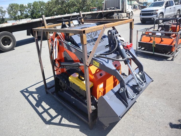 tpm-t460-stand-on-skid-steer-loader-image-1