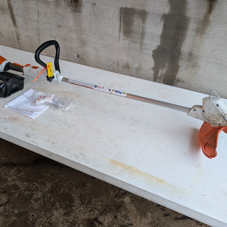 Battery-powered Stihl FSA57 Weedeater w/charger & two batteries. #256